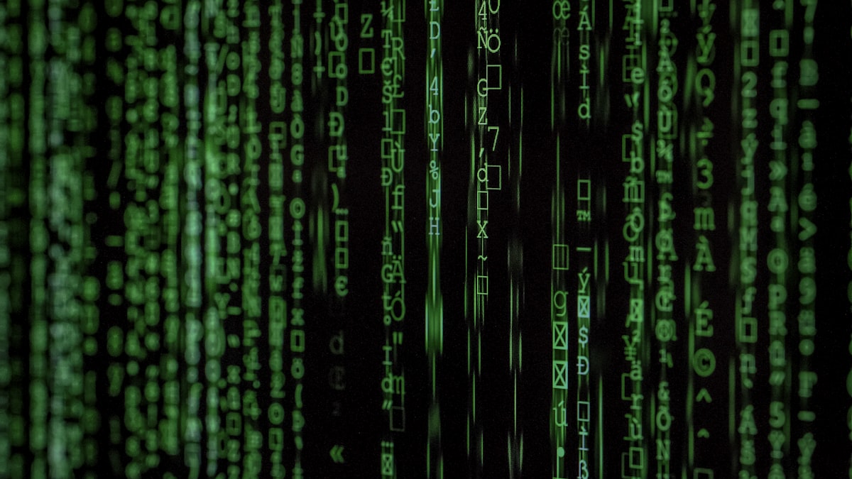 Binary code and digital text on screen — evaluating end-to-end encryption claims beyond marketing language
