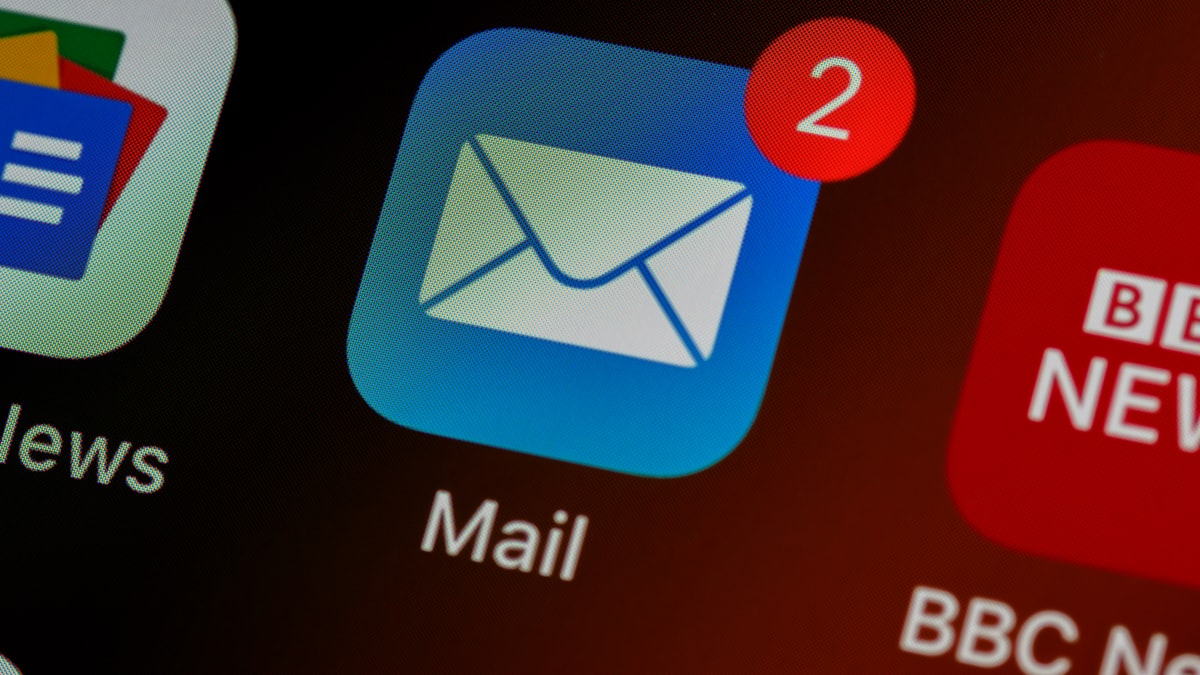 Email inbox on phone — why attachments create permanent server copies across relay servers and what safer alternatives exist