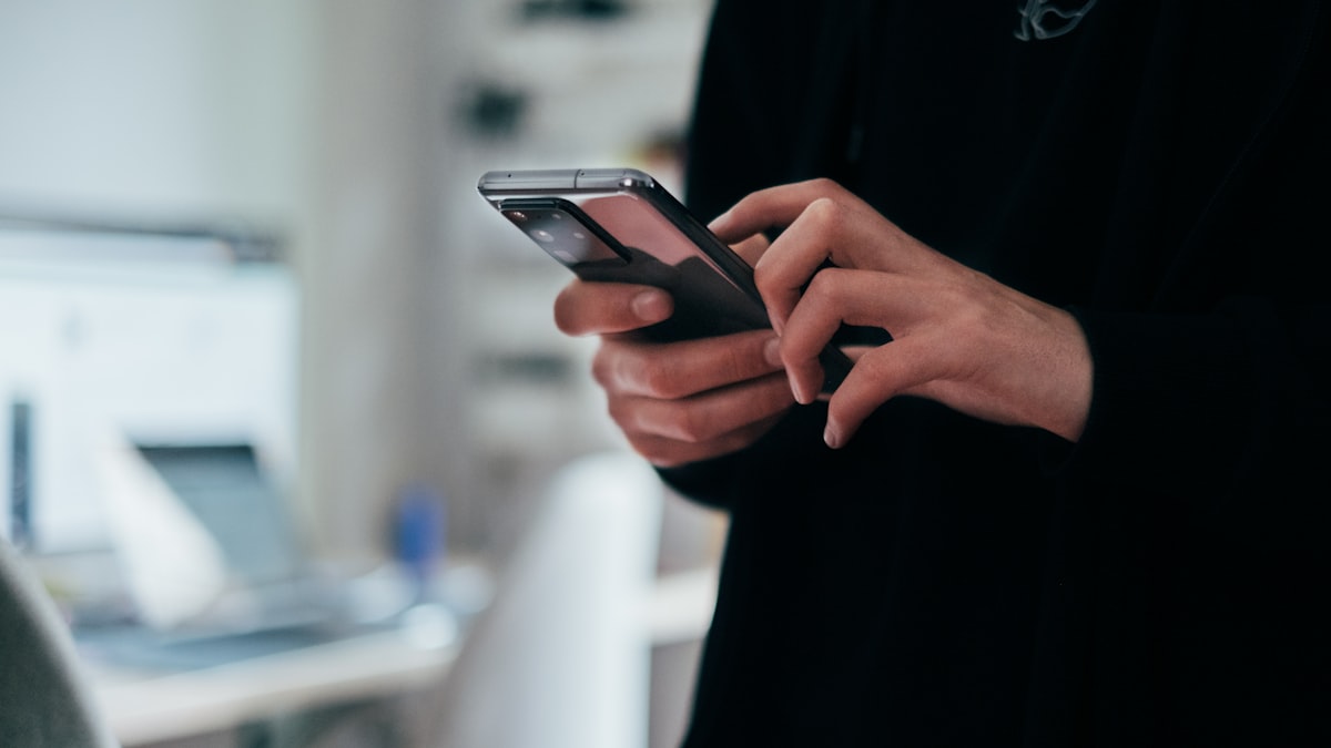 Person holding Android smartphone — understanding what private file transfer actually protects against